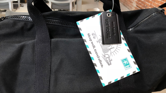 Picture of a bag with a custom travel tag on it