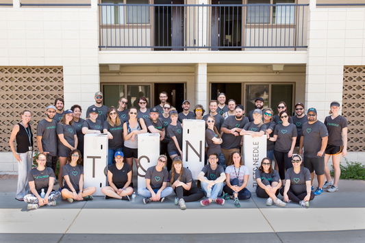 Tuft and Needle employees posing for a photo after a volunteer opportunity
