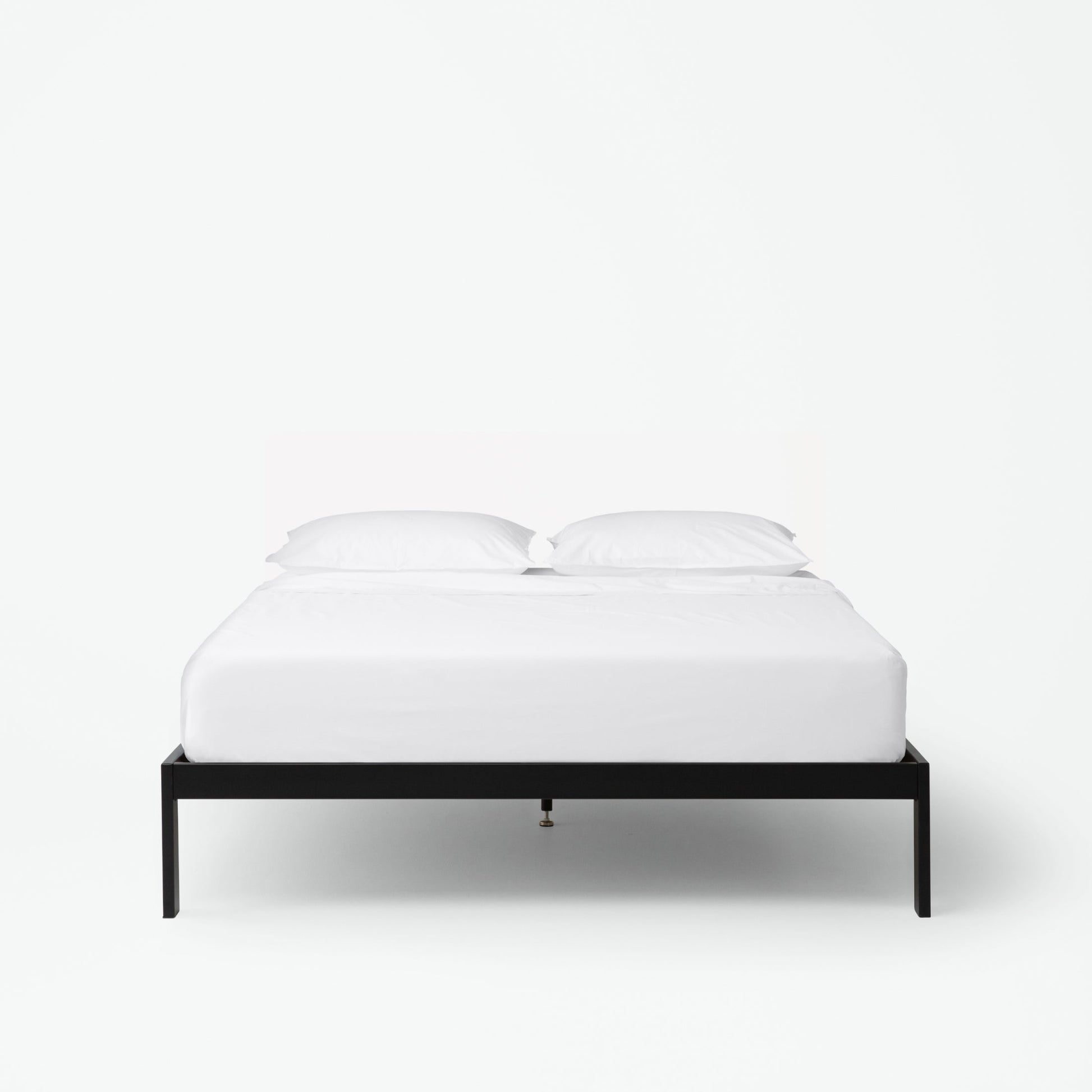 The  Tuft and Needle Essential Platform Bed Frame with a mattress||color:black
