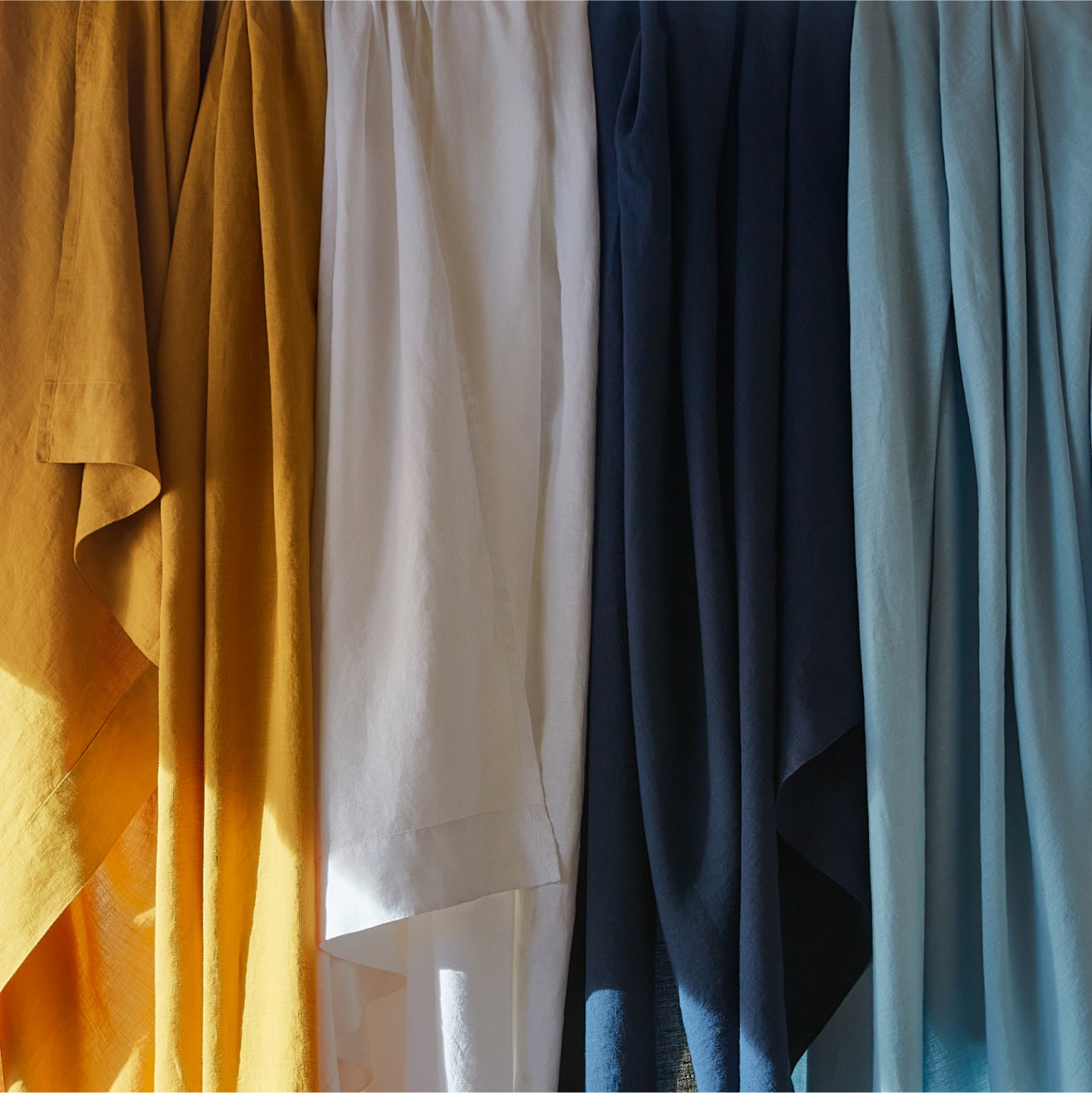 images of 4 different colored sheets, honeycomb, cloud, midnight and morning