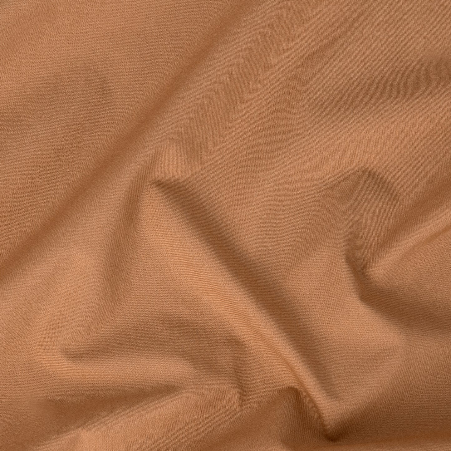 Close-up view of the fabric on the Tuft and Needle Percale Pillowcase Set||color:canyon