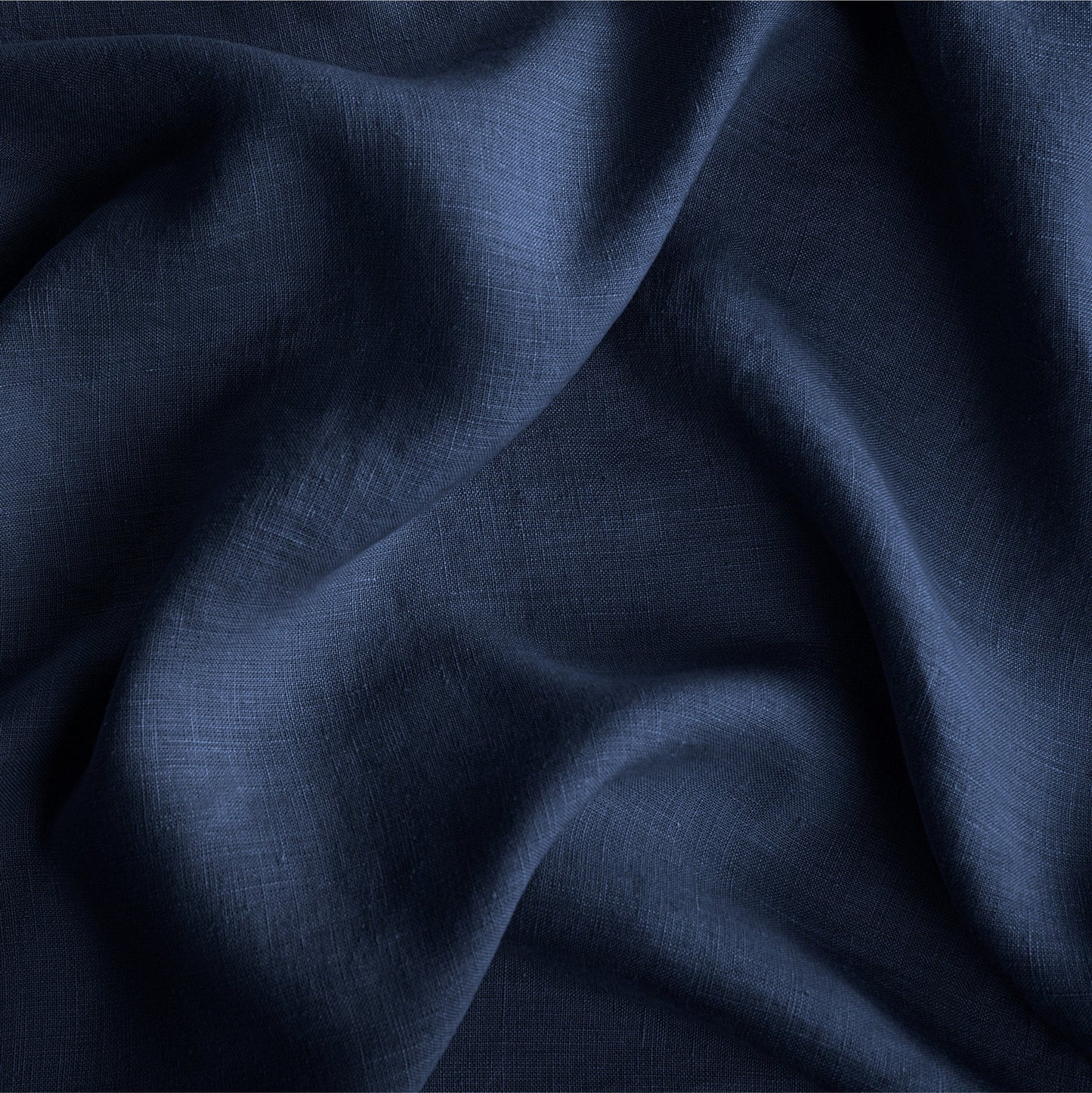 Close up of the Tuft and needle midnight color sheet set