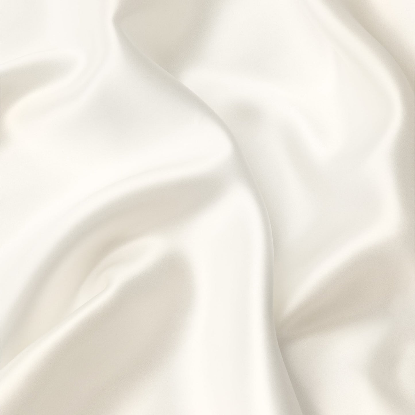 Close-up view of the fabric on the Tuft and Needle Silk Pillowcase||color:cloud