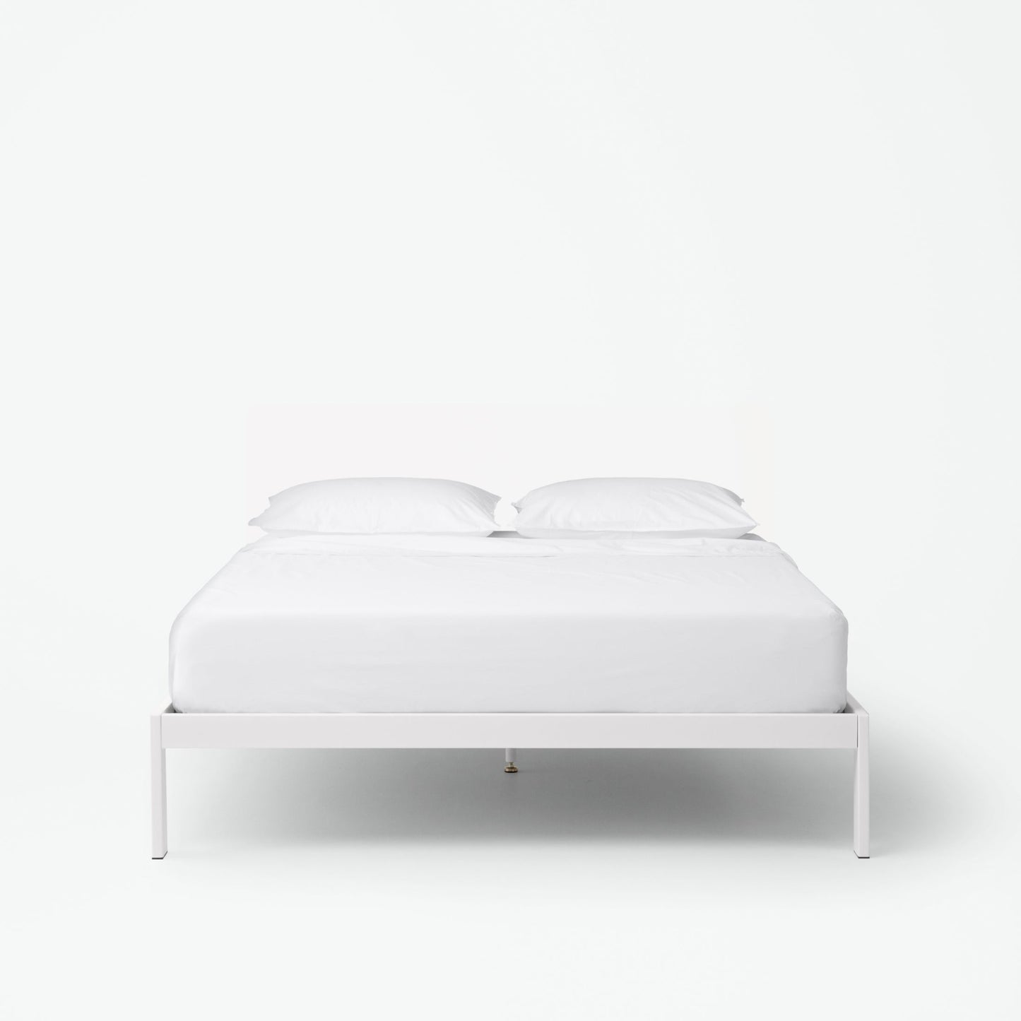 The Tuft and Needle Essential Platform Bed Frame with a mattress||color:white