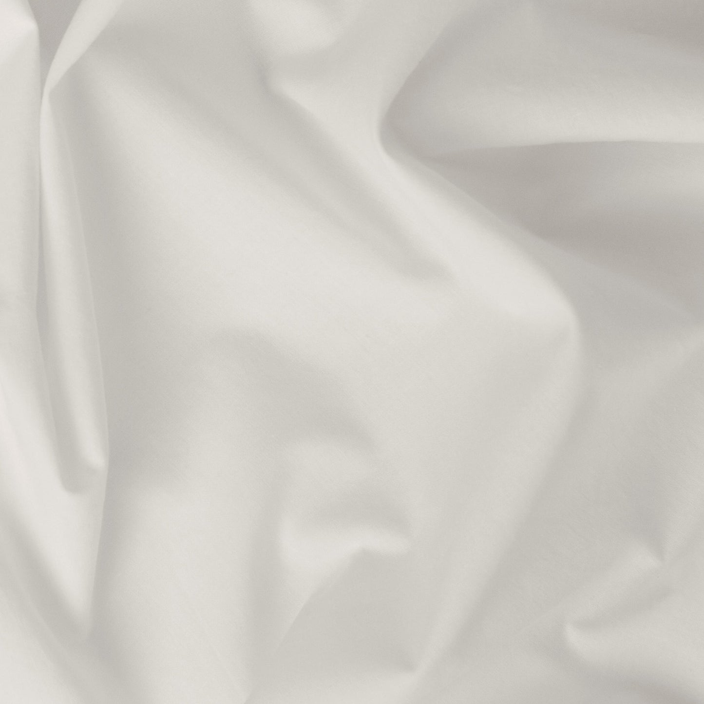 Close-up view of the fabric on the Tuft and Needle Percale Pillowcase Set||color:sand