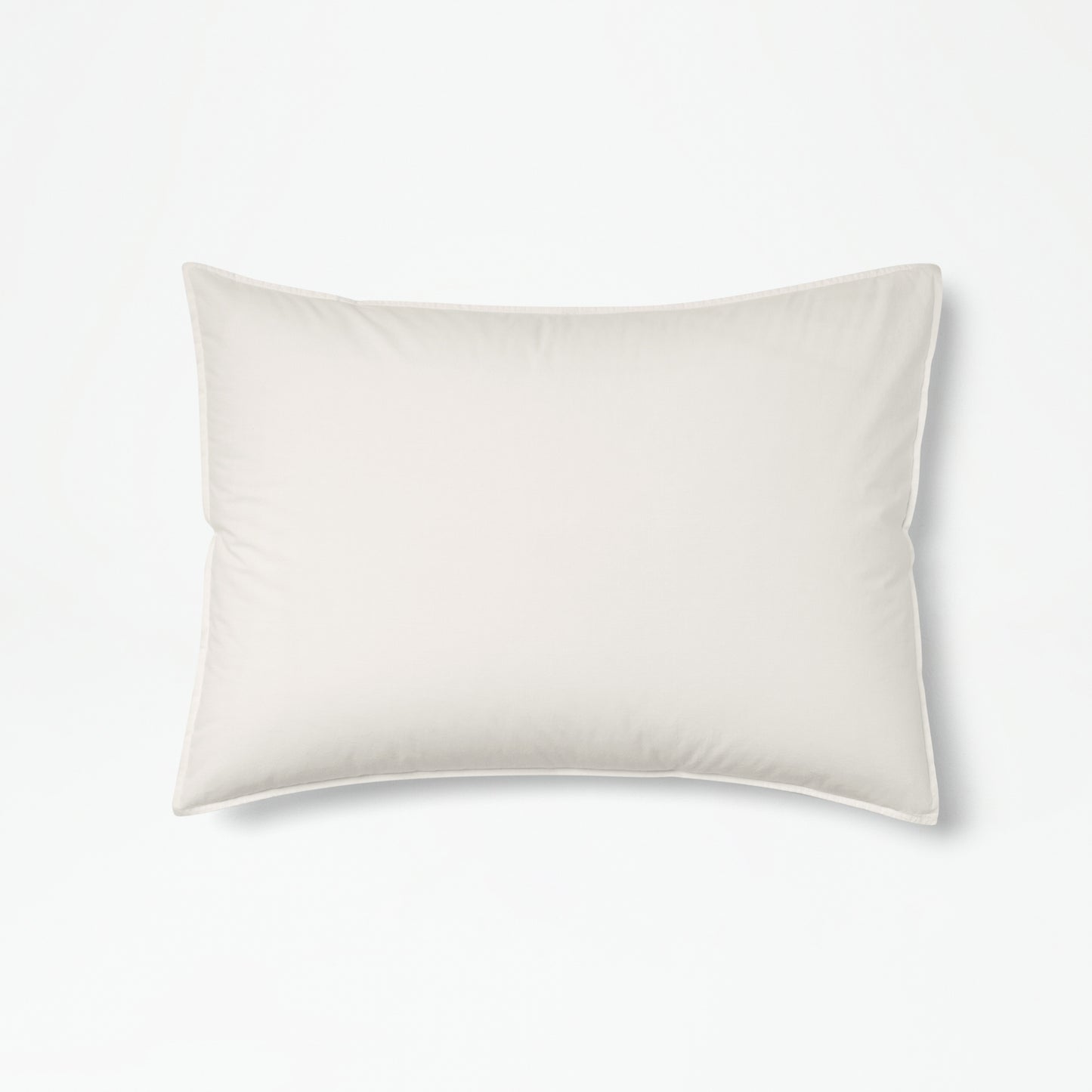 The Tuft and Needle Percale Duvet Cover Set on a mattress in a bedroom||color:sand