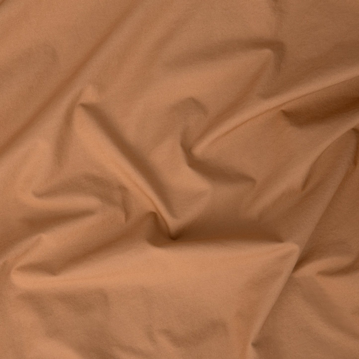 Close-up view of the fabric on the the Tuft and Needle Percale Duvet Cover Set||color:canyon