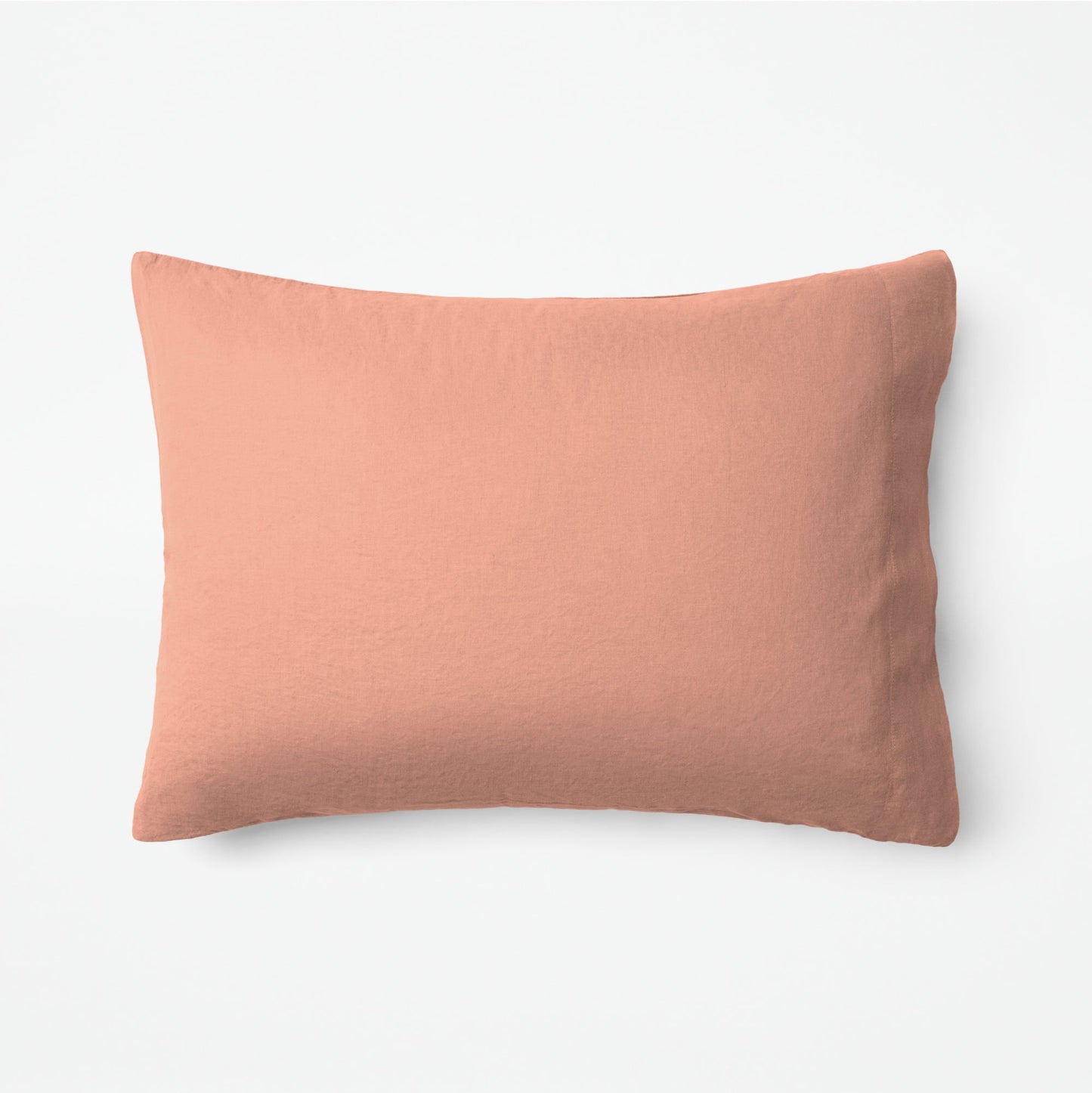 The Tuft and Needle Linen-Cotton Blend Duvet Set, one pillow laying horizontally || color: Muted Clay