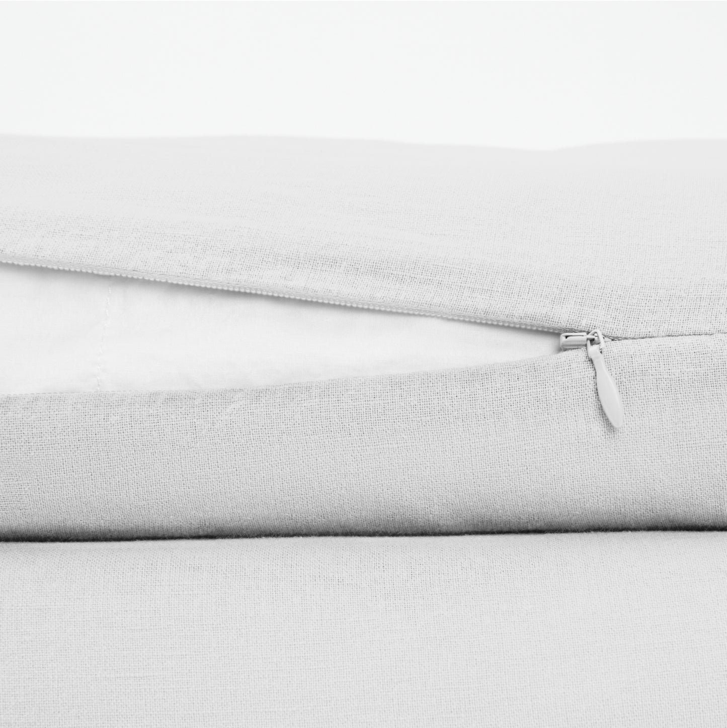 The Tuft and Needle Linen-Cotton Blend Duvet Set, zipper closure on the side of the pillow || color: Cloud