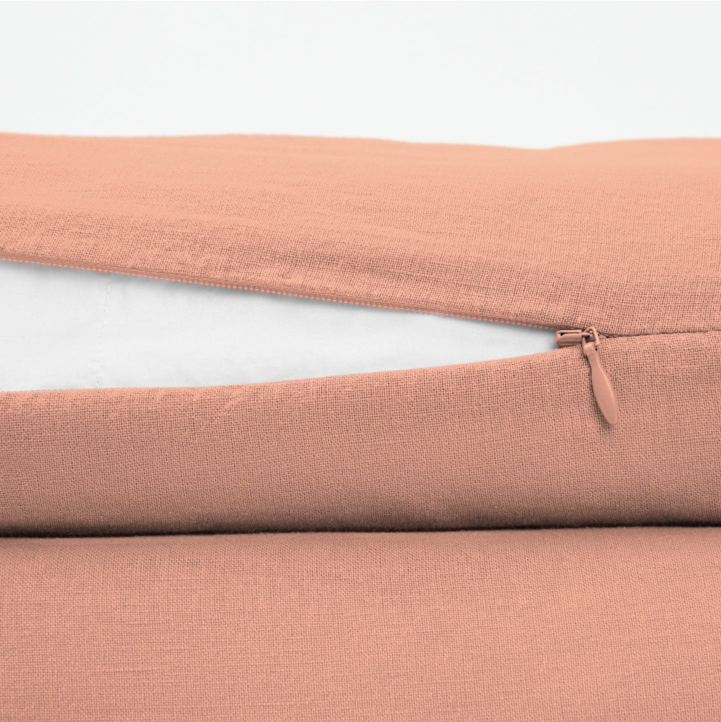 The Tuft and Needle Linen-Cotton Blend Duvet Set, zipper closure on the side of the pillow || color: Muted Clay