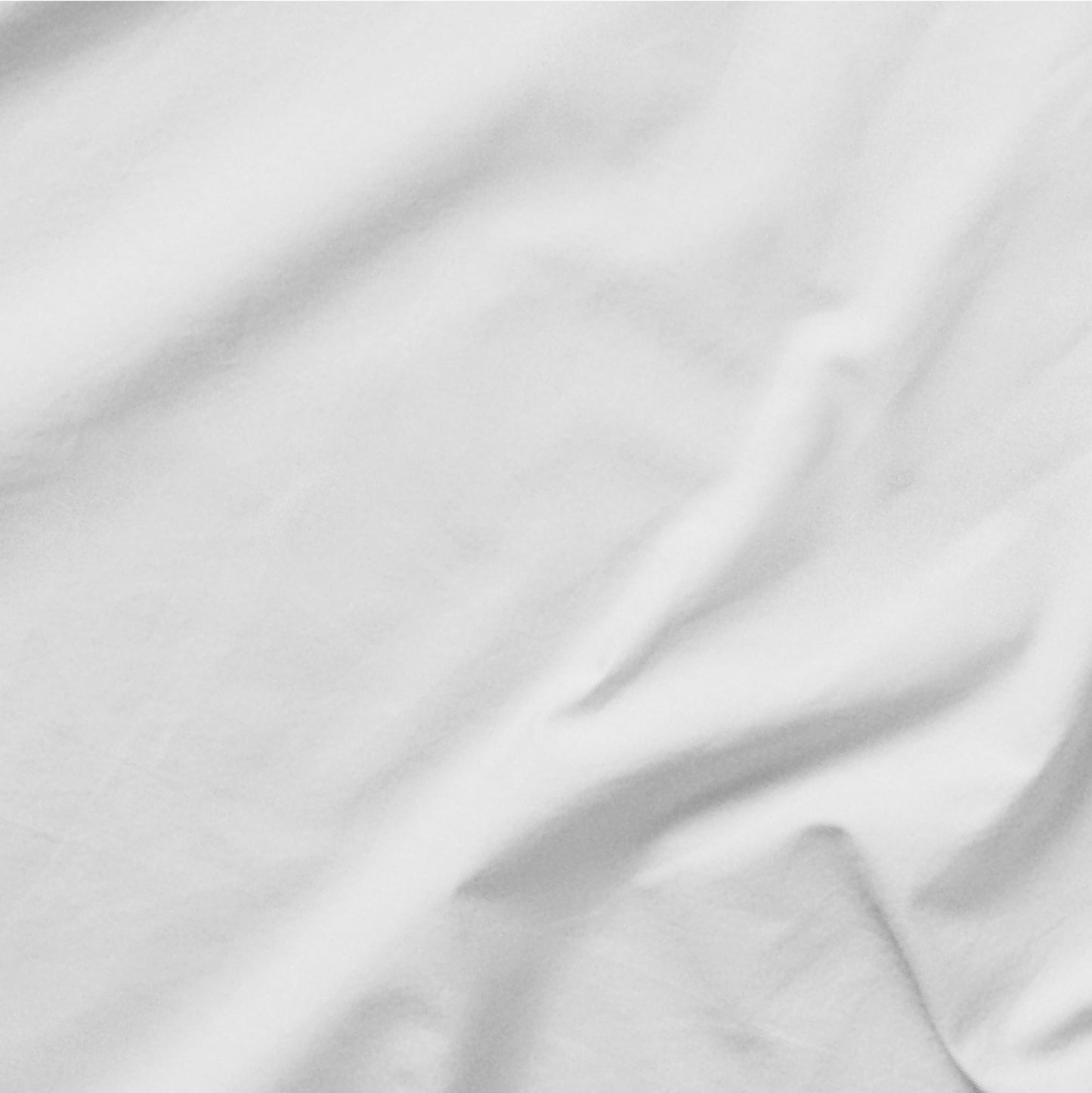 The Tuft and Needle Classic Percale Sheet Set, one sheet spread out || color: Cloud