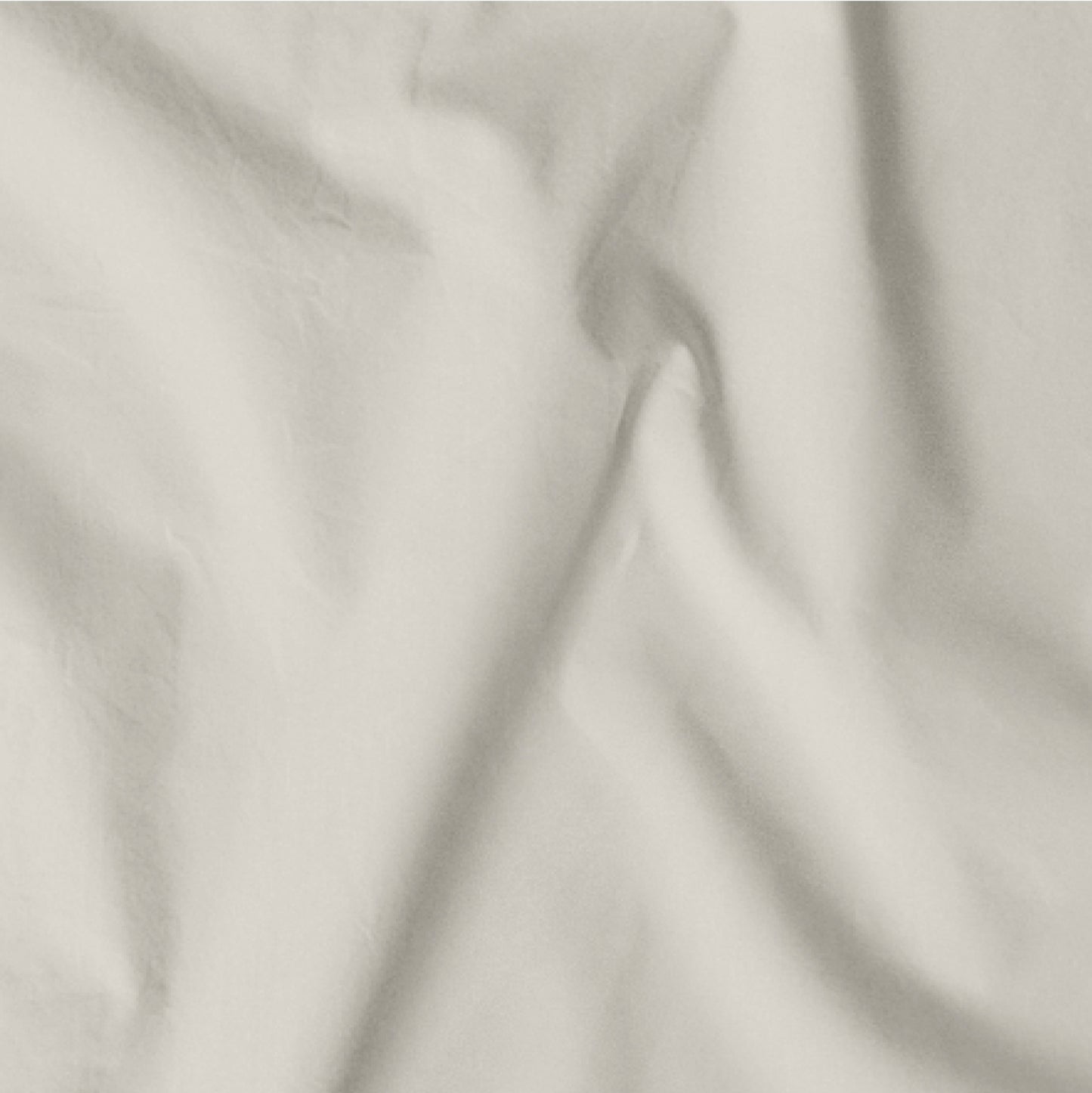 The Tuft and Needle Classic Percale Sheet Set, one sheet spread out || color: Sand