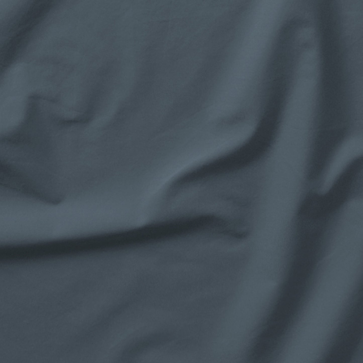 The Tuft and Needle Classic Percale Sheet Set, one sheet spread out || color: Slate