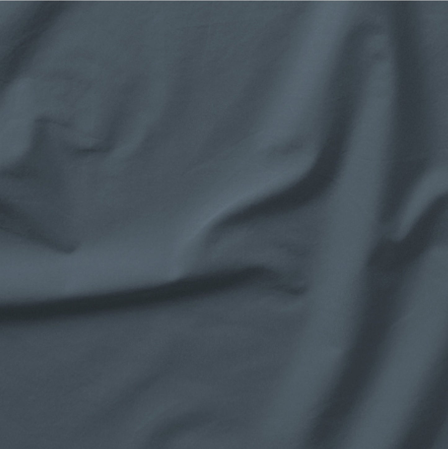 The Tuft and Needle Classic Percale Pillowcase Set, one sheet spread out || color: Slate