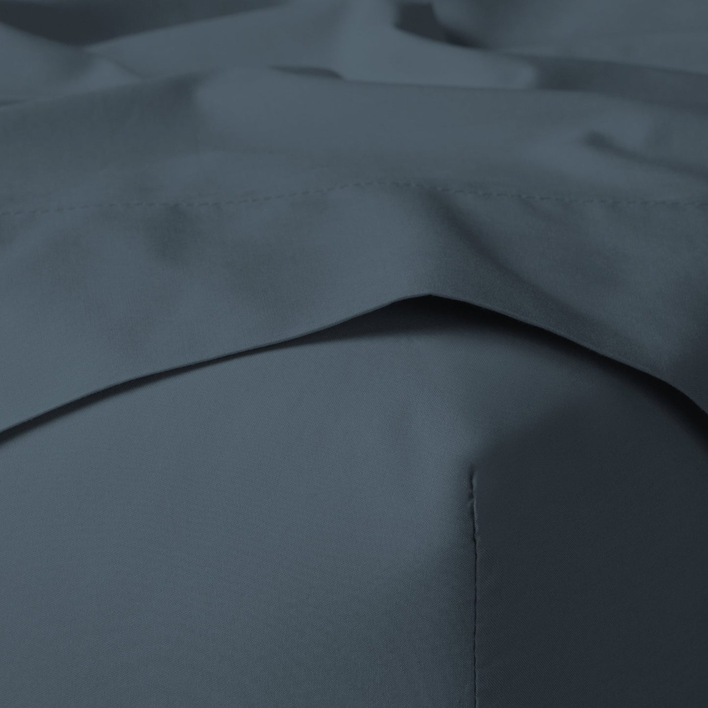 The Tuft and Needle Classic Percale Sheet Set, corner of a mattress with both sheets showing || color: Slate