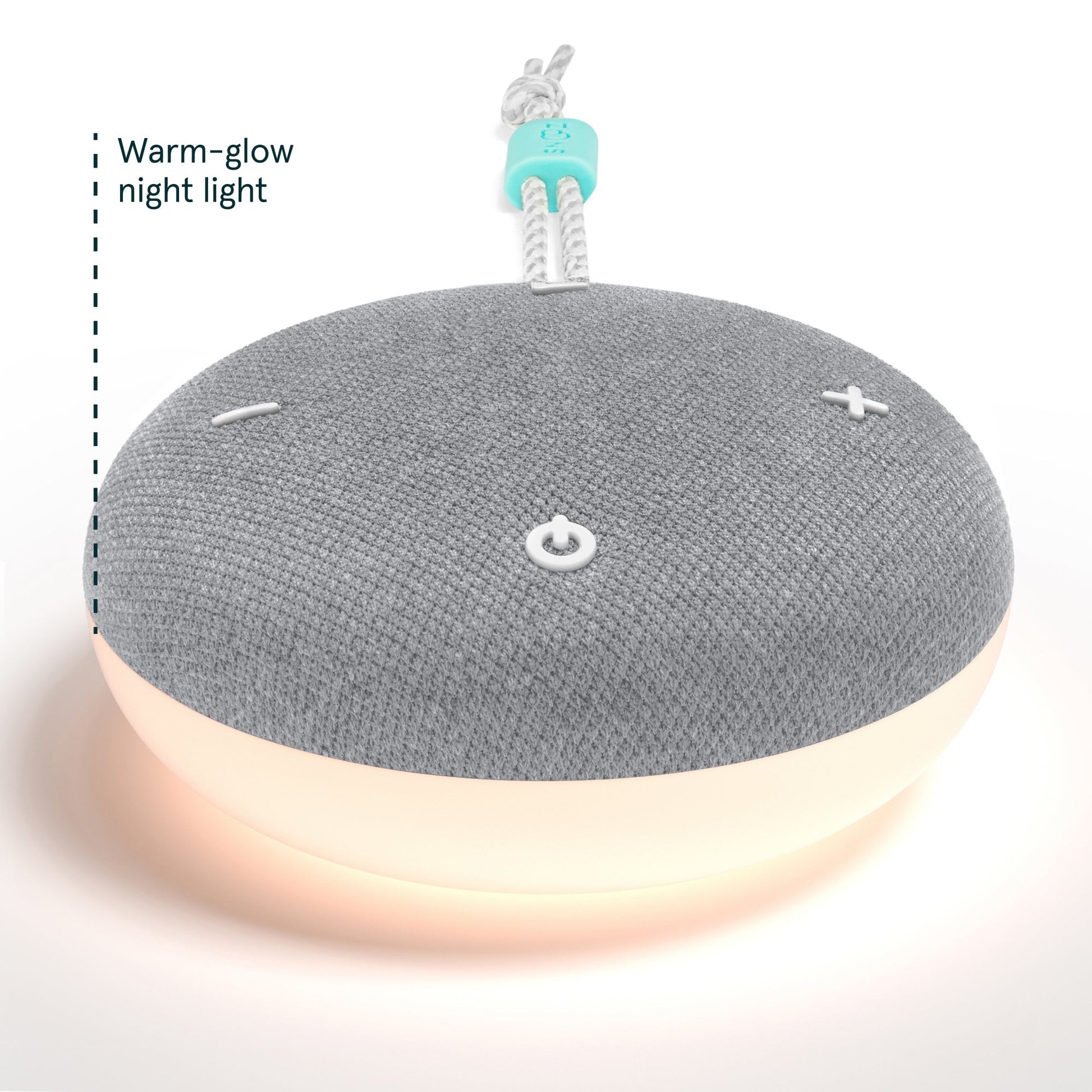 Closeup of the Snooz Go Travel White Noise Machine showing the warm-glow night light