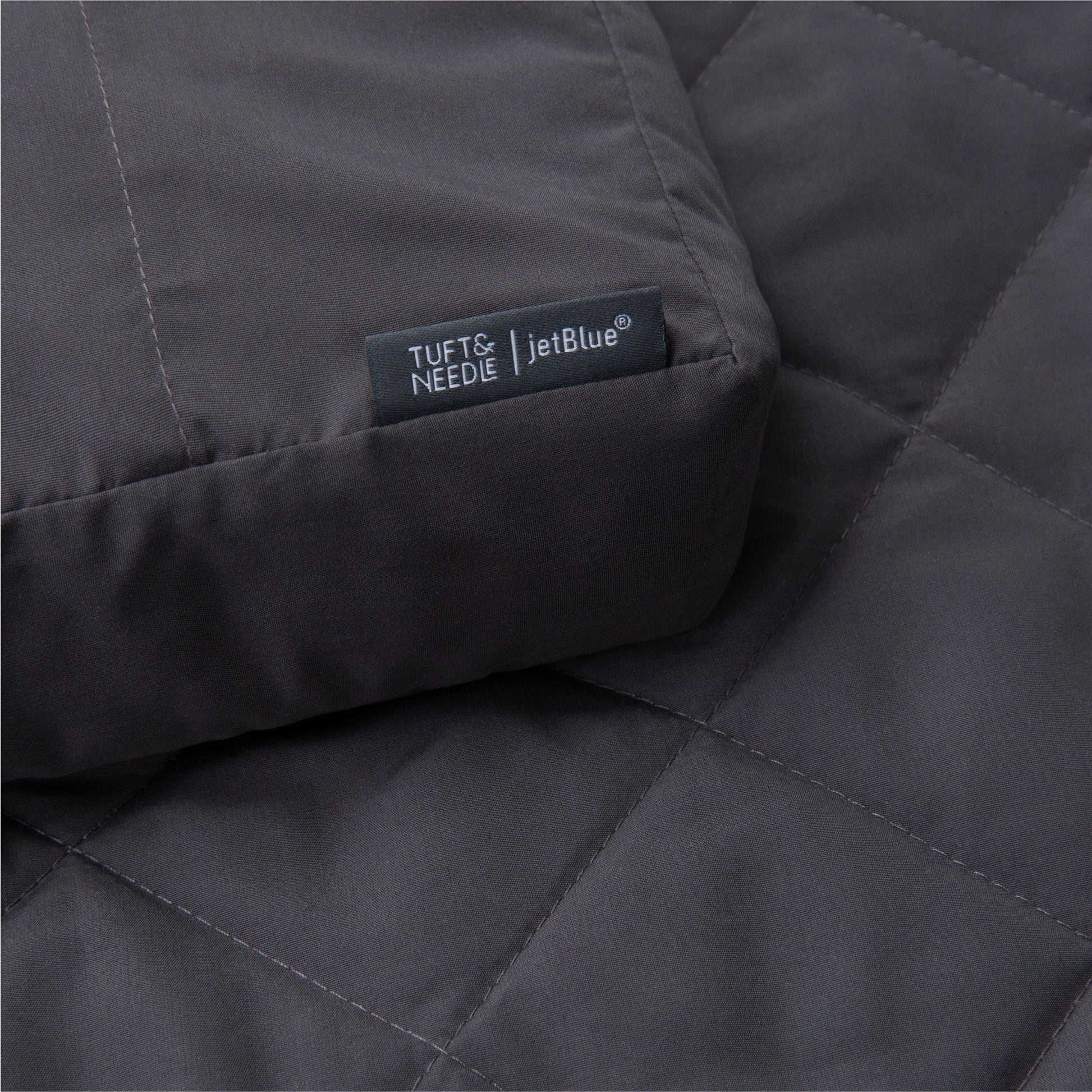 Close up image of the Anywhere Travel Blanket in color flint
