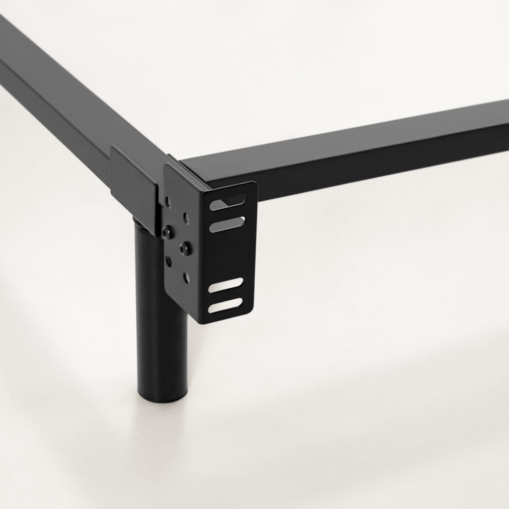 Corner view of the the Tuft and Needle Metal base||color:black