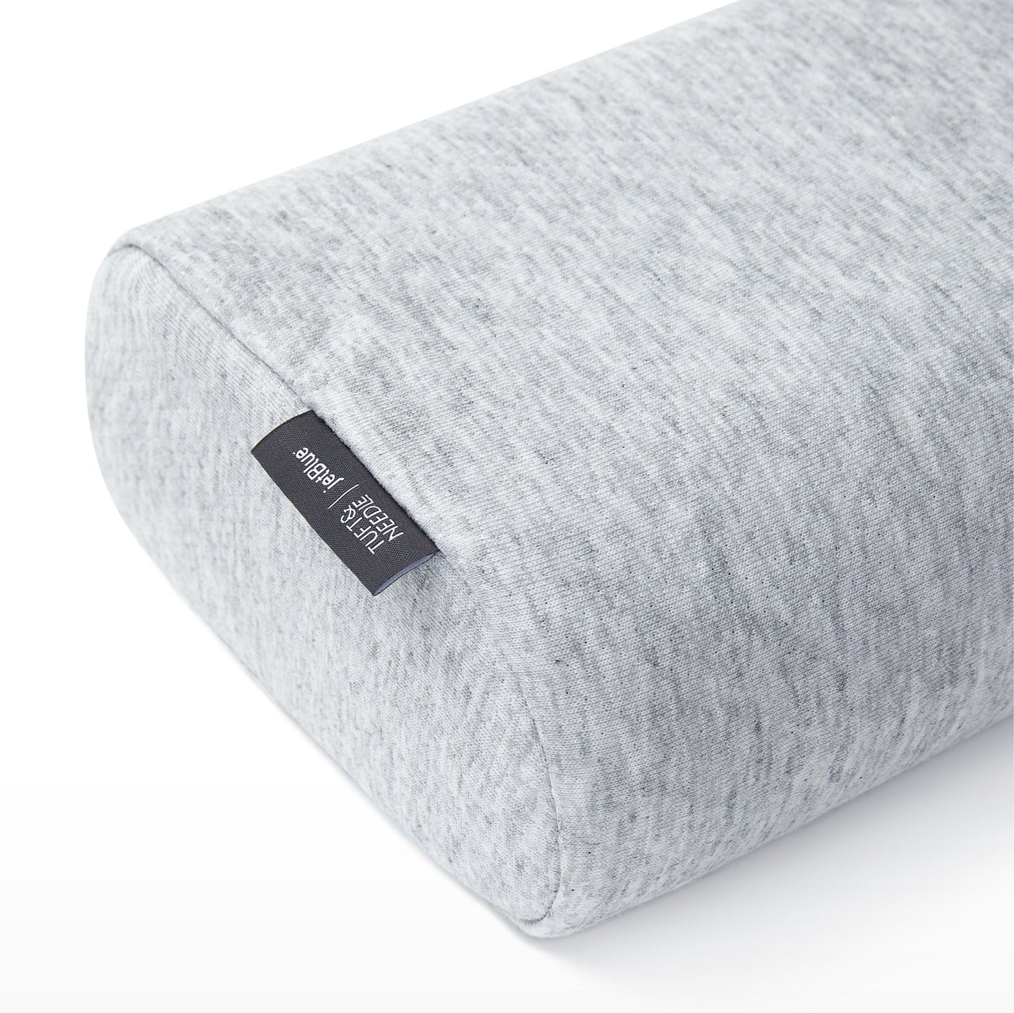 Close-up corner view of the Tuft and Needle Anywhere Travel pillow||color:granite