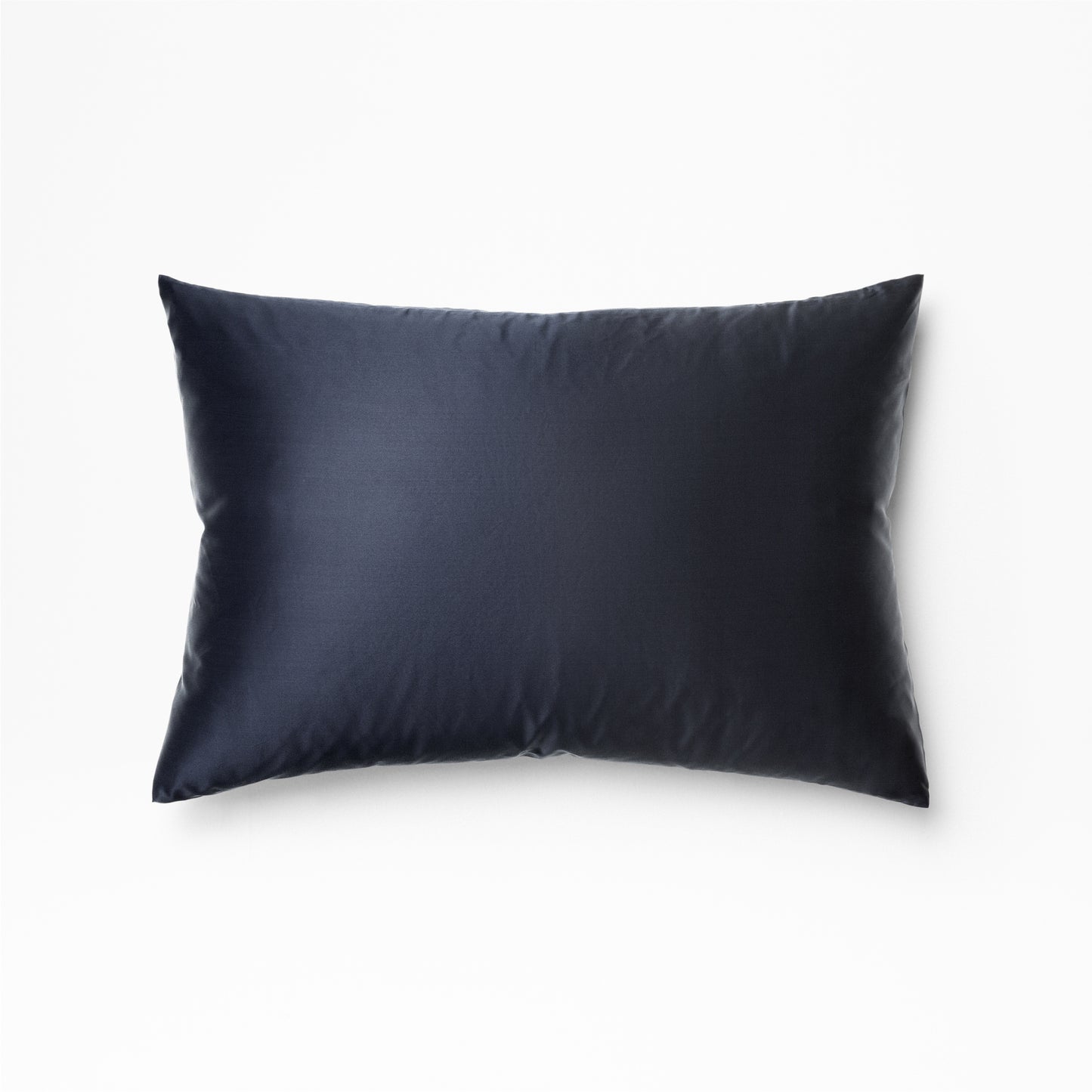 The Tuft and Needle Silk Pillowcase on a white background||color:midnight