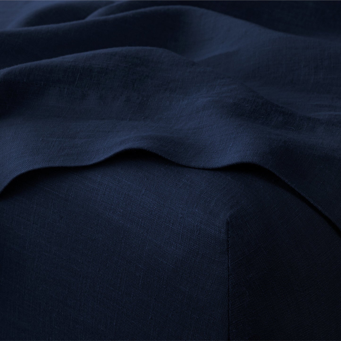Closeup of the color Midnight Tuft and Needle Hemp sheet