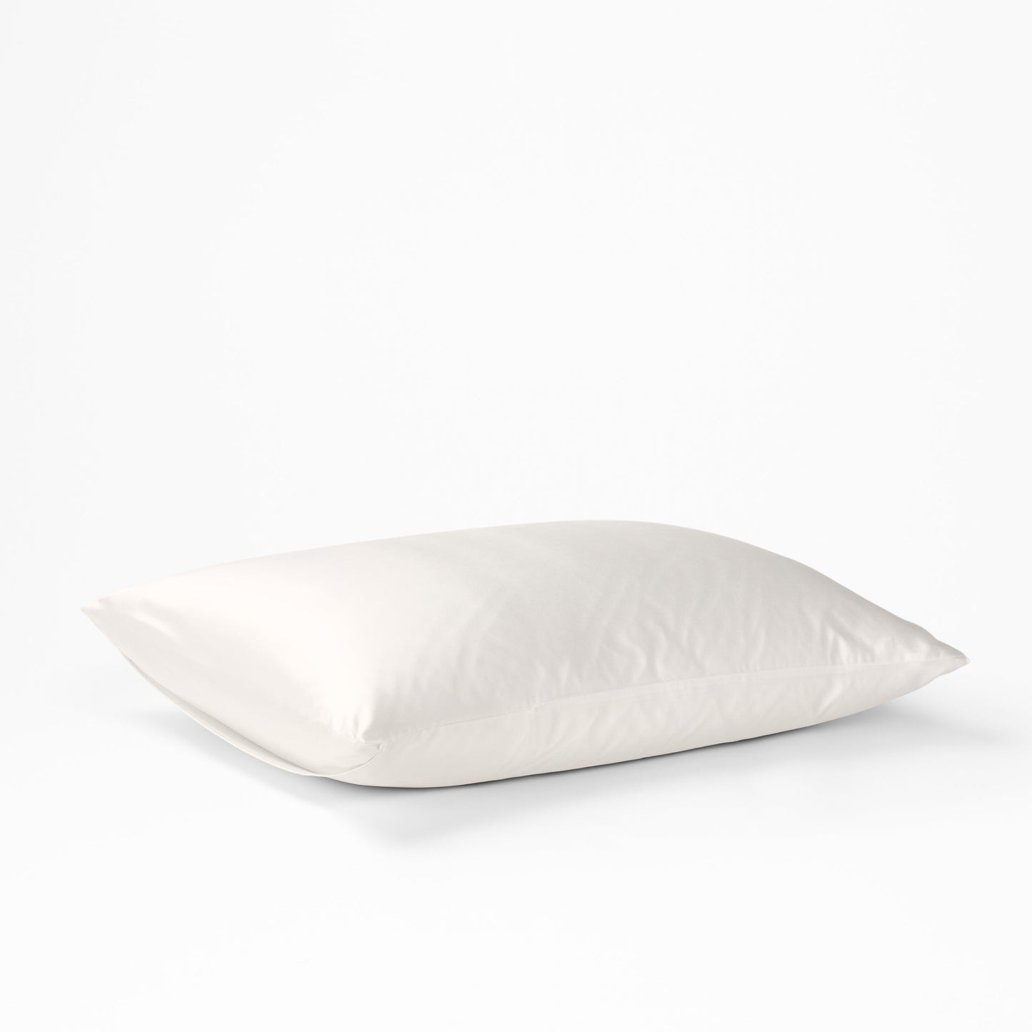 The Tuft and Needle Silk Pillowcase on a white background||color:cloud