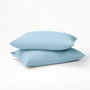 The Tuft and Needle Hemp Pillowcase Set on two pillows stacked||color:morning