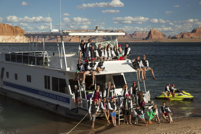 Tuft & Needle Team hanging out on a house boat and posing for a picture during a team building activity