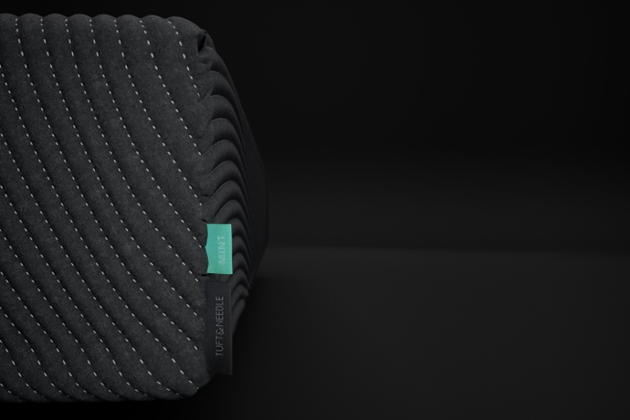 Dark picture of the corner of the Tuft & Needle Mint Mattress