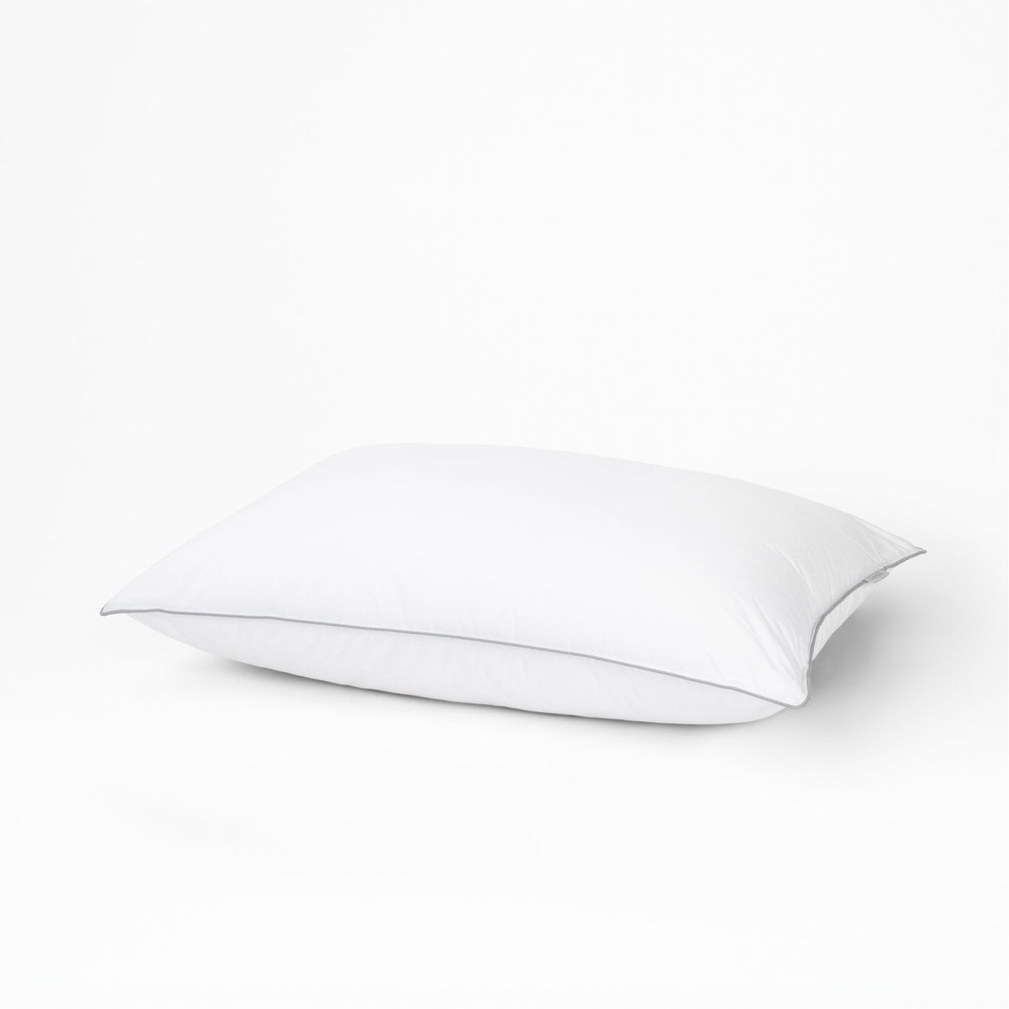 One tuft and needle down alternative pillow