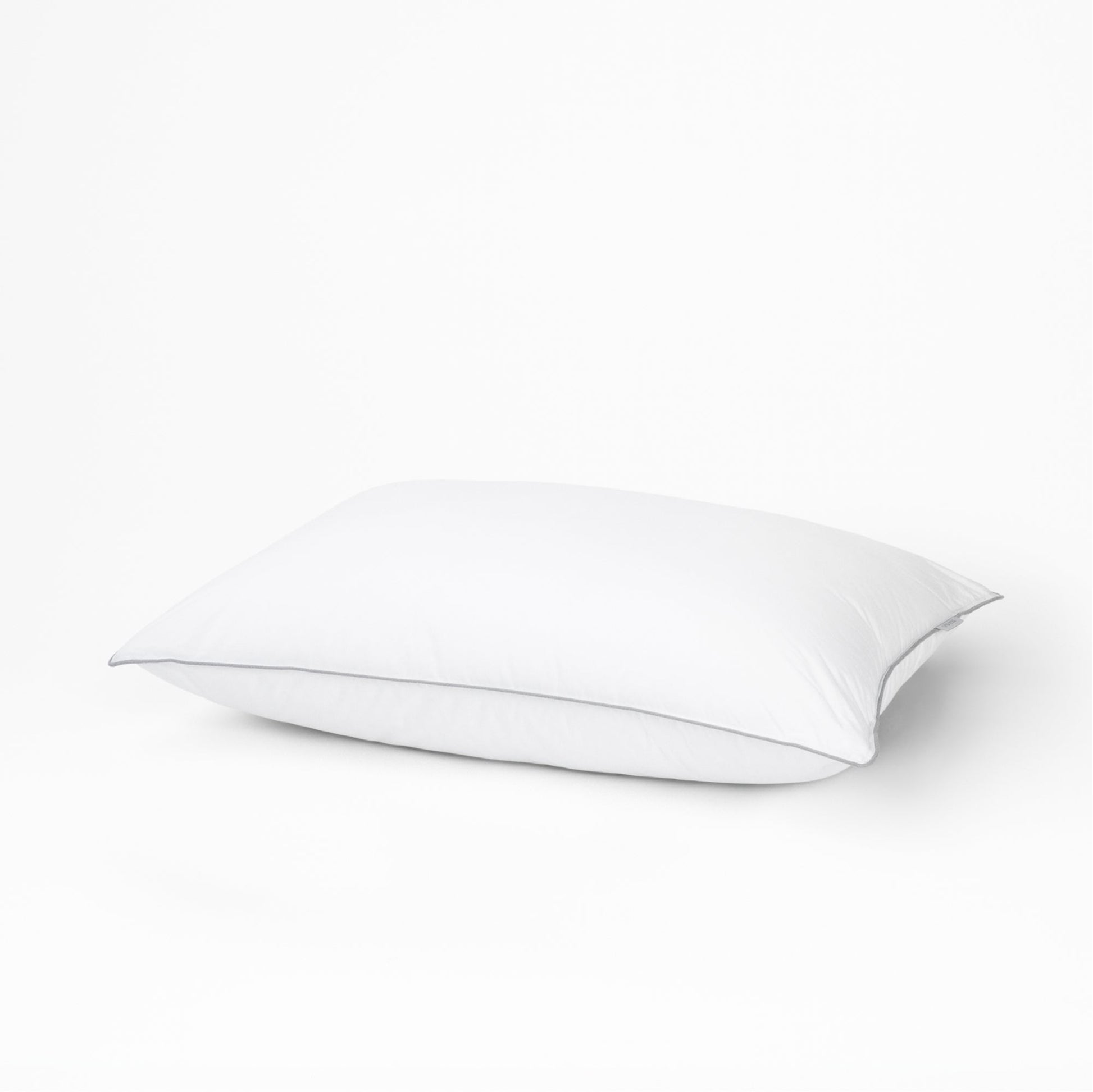 One tuft and needle down alternative pillow