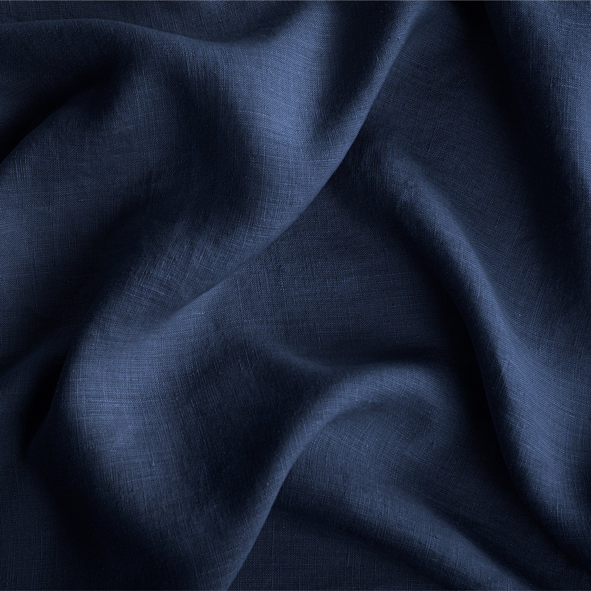 Close up of the Tuft and needle midnight color sheet set