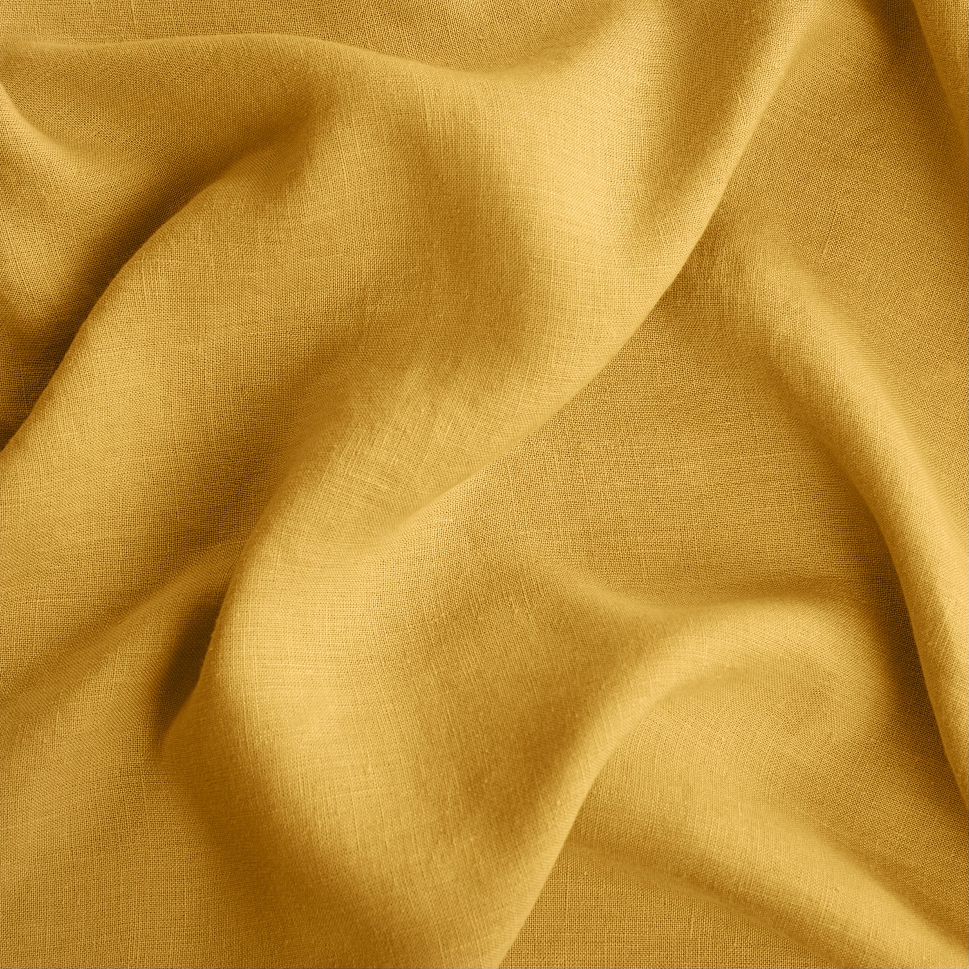 Close-up view of the fabric used on the Tuft and Needle Hemp Duvet Cover||color:honeycomb