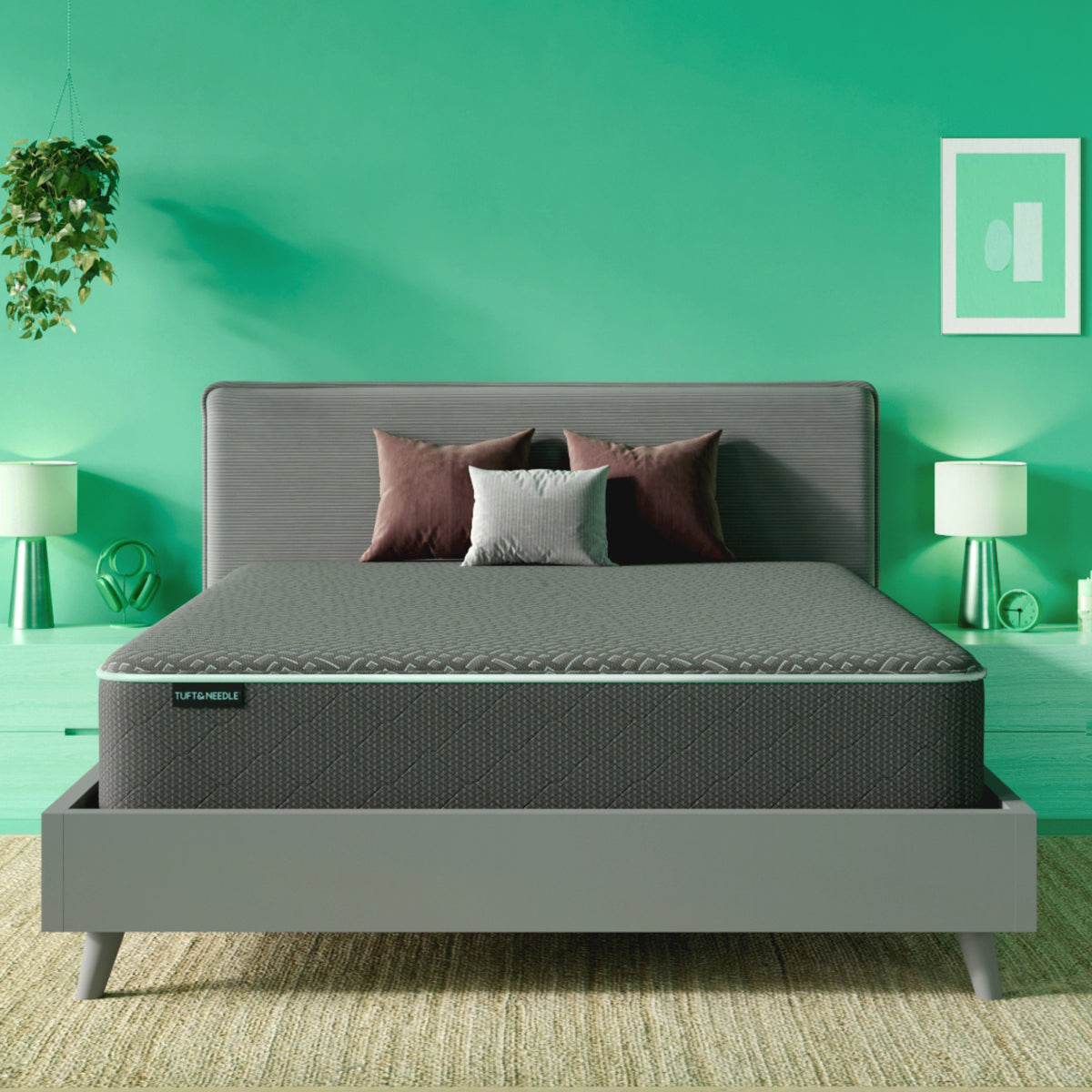 The Tuft and Needle Mint hybrid Mattress II in a green bedroom
