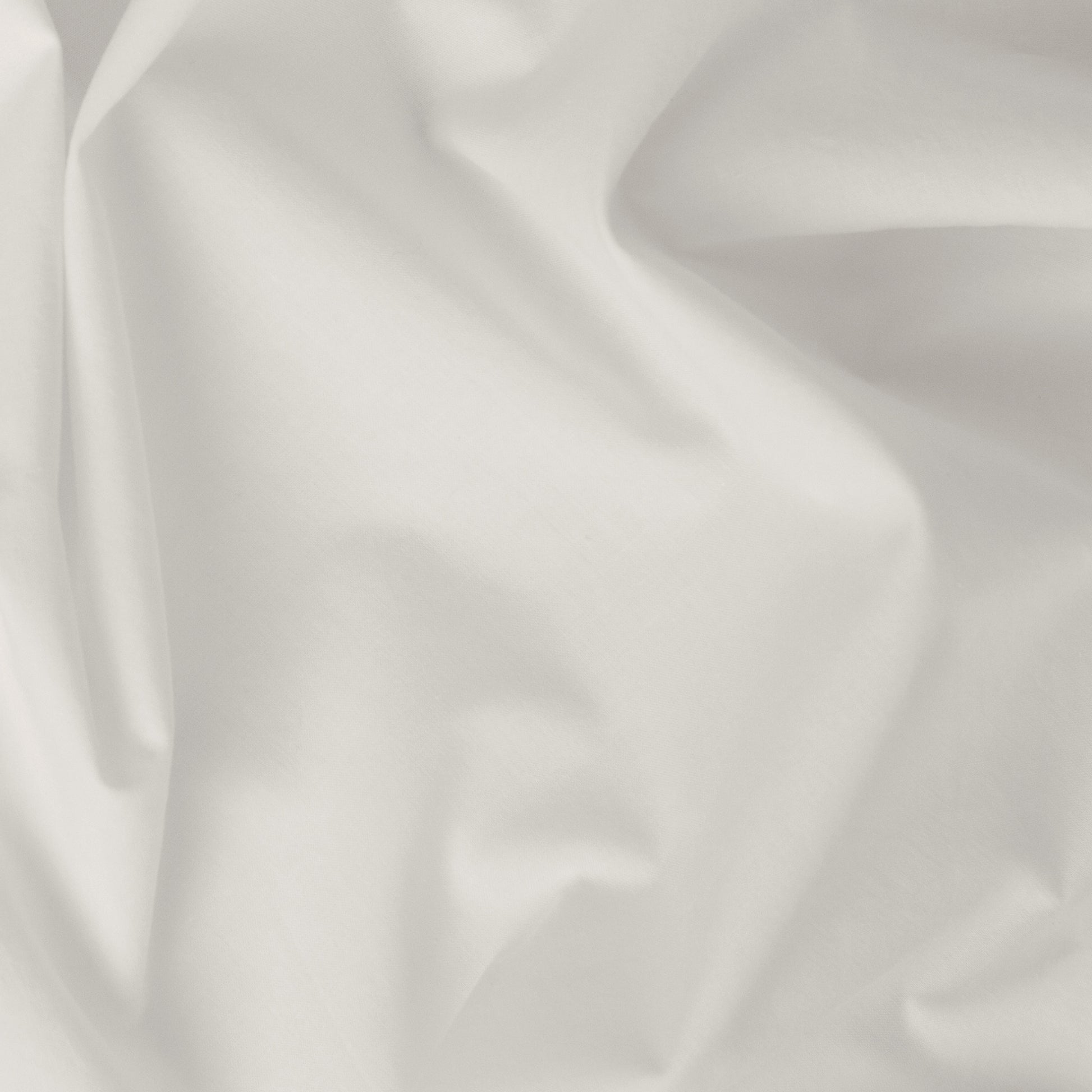 Close-up view of the fabric on the the Tuft and Needle Percale Duvet Cover Set||color:sand