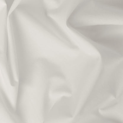 Close-up view of the fabric on the Tuft and Needle Percale Pillowcase Set||color:sand