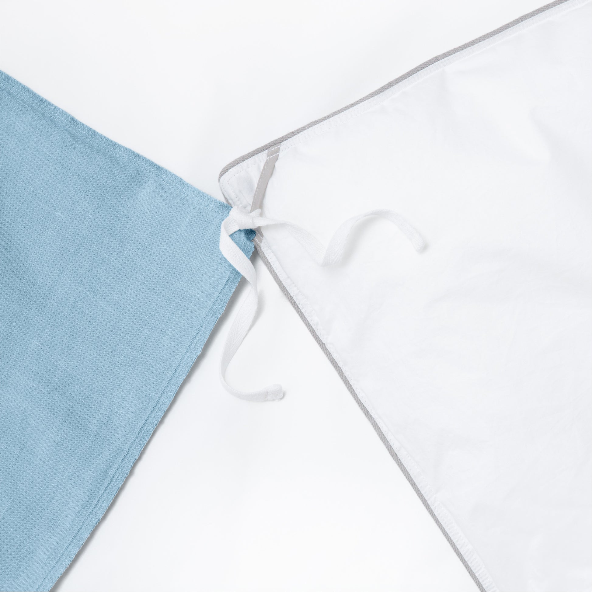 Close-up view of the corner ties on the Tuft and Needle Hemp Duvet Cover||color:honeycomb