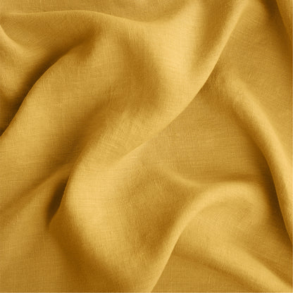 Close-up view of the fabric used on the Tuft and Needle Hemp Duvet Cover||color:honeycomb