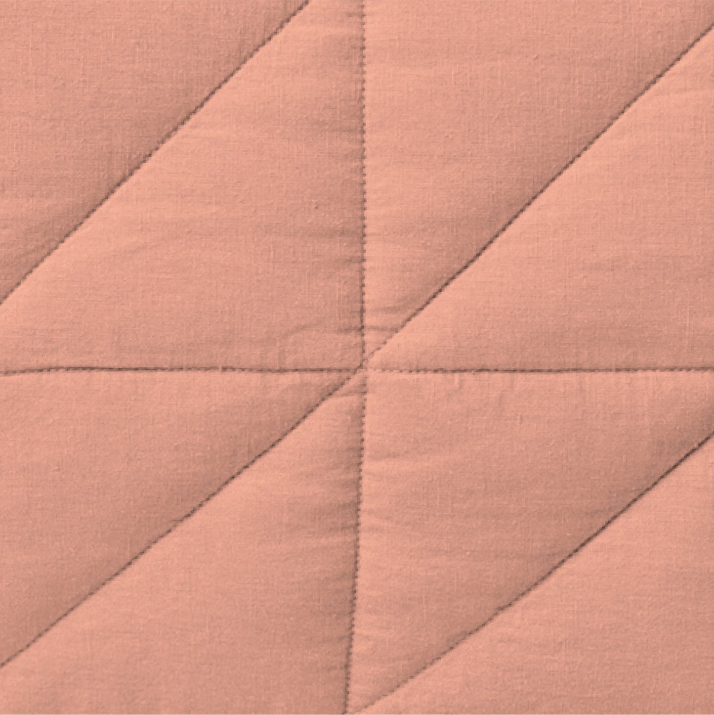 The Tuft and Needle Linen-Cotton Blend Body Pillow Cover, closeup of the body pillow cover || color: Muted Clay
