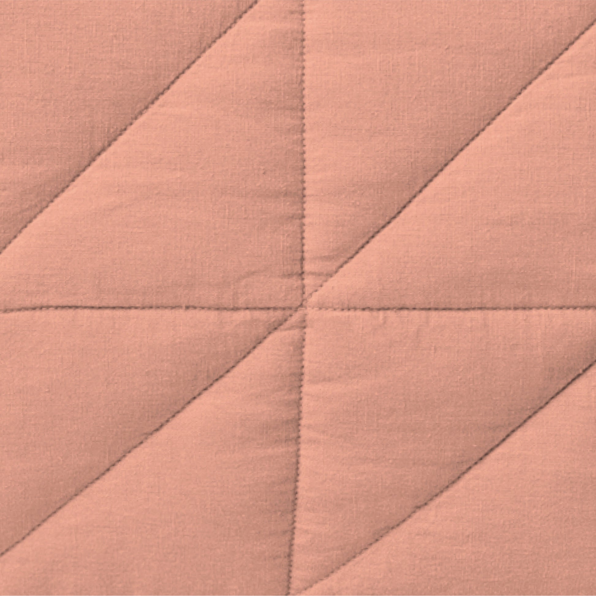 The Tuft and Needle Linen-Cotton Blend Body Pillow Cover, closeup of the body pillow cover || color: Muted Clay
