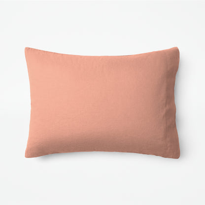 The Tuft and Needle Linen-Cotton Blend Duvet Set, one pillow laying horizontally || color: Muted Clay
