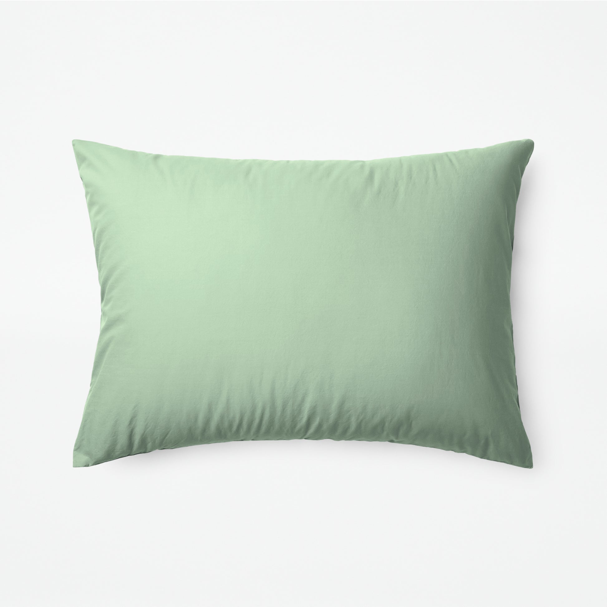 The Tuft and Needle Classic Percale Sheet Set, one pillow laying horizontally || color: Sage
