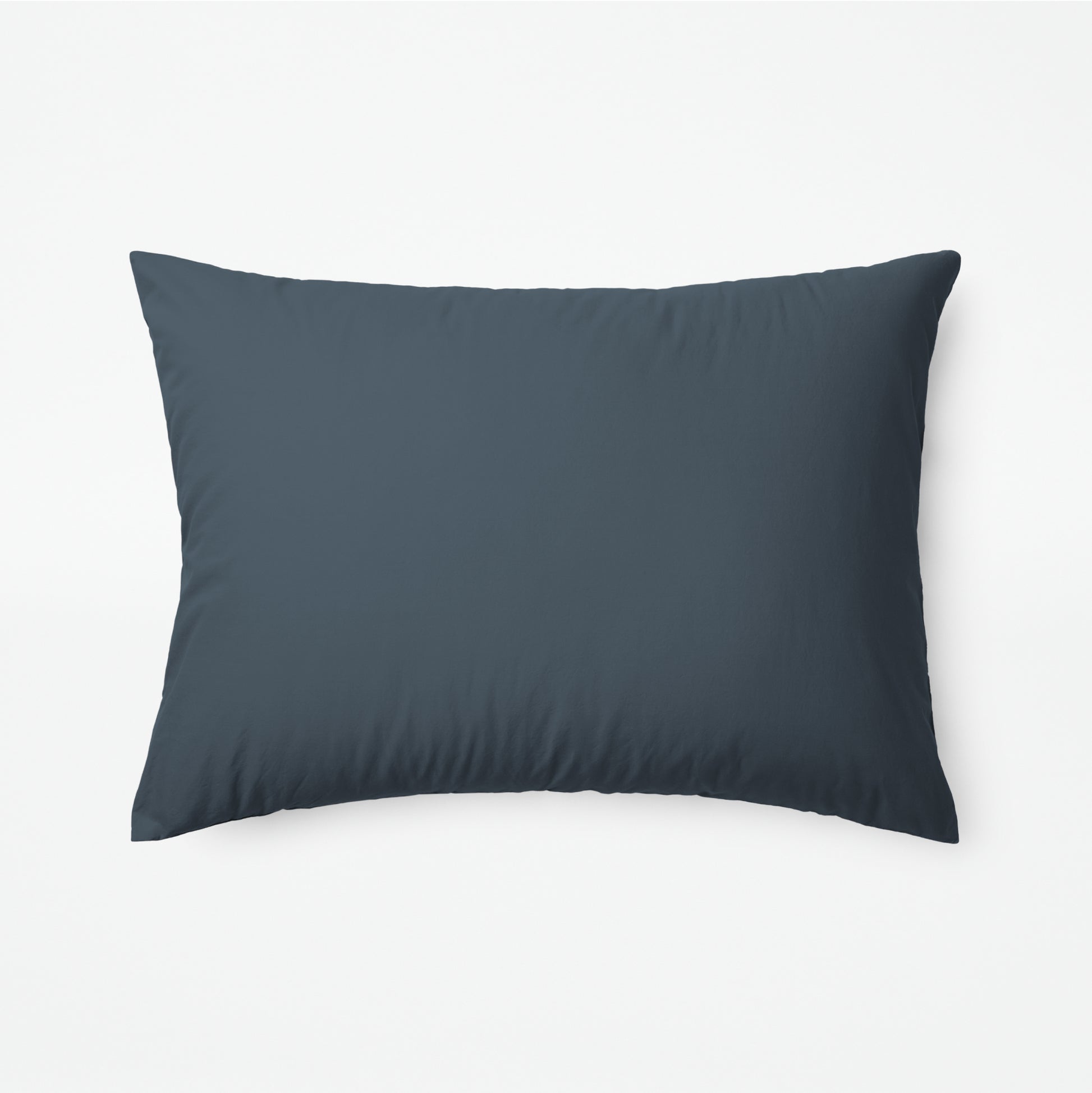 The Tuft and Needle Classic Percale Sheet Set, one pillow laying horizontally || color: Slate
