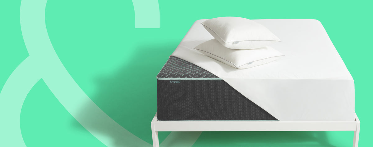 Tuft and Needle mattress protector and sheet set on a mattress
