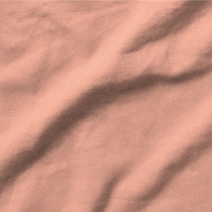 The Tuft and Needle Linen-Cotton Blend Sheet Set, one sheet spread out || color: Muted Clay
