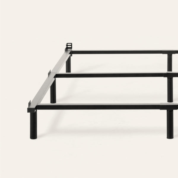 Tuft & Needle Black metal bed frame on a white background