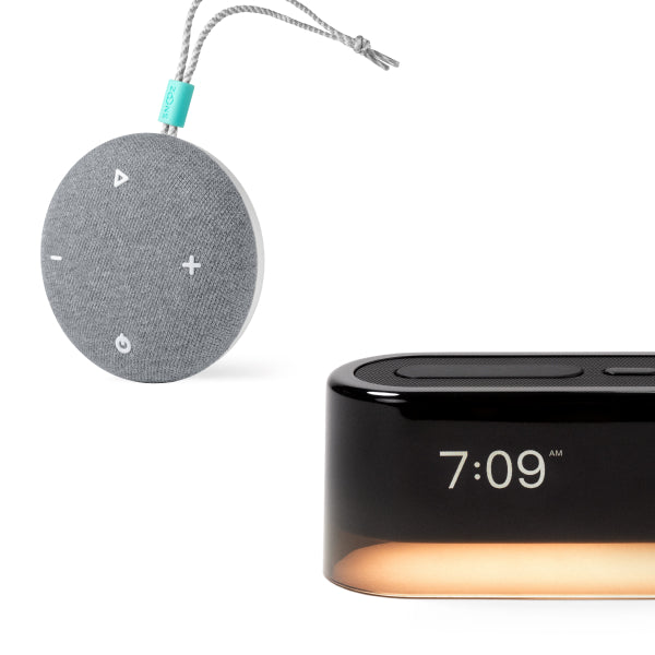 2 Tuft and Needle Sleep tech products, white noise machine and alarm clock, pictured on a white background