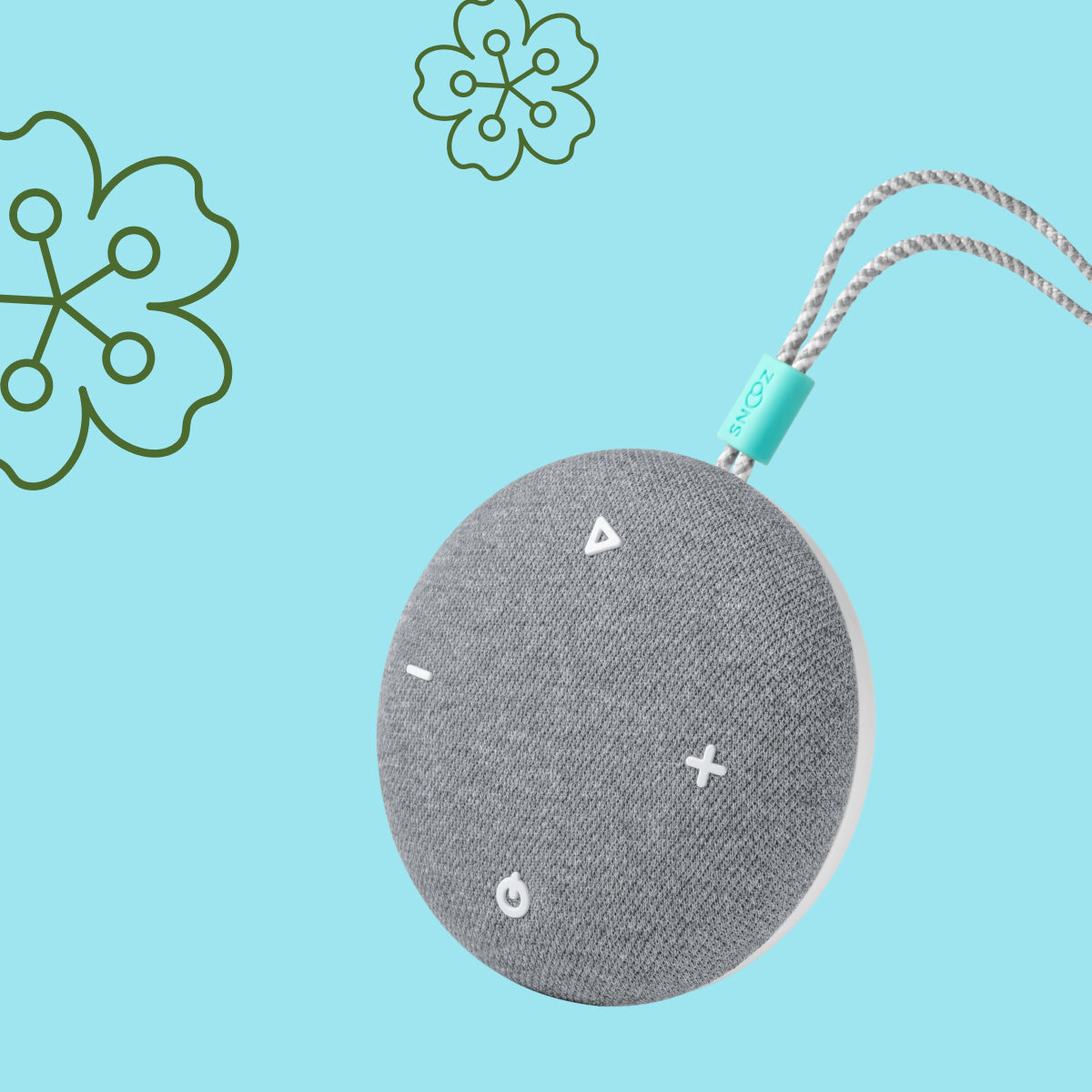 Round gray Tuft and Needle speaker with a cord on a light blue background with floral designs