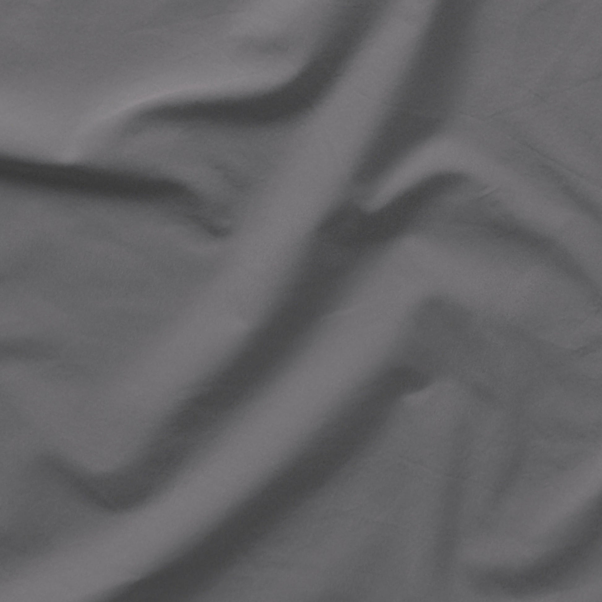 The Tuft and Needle Classic Percale Sheet Set, one sheet spread out || color: Gray Quill
