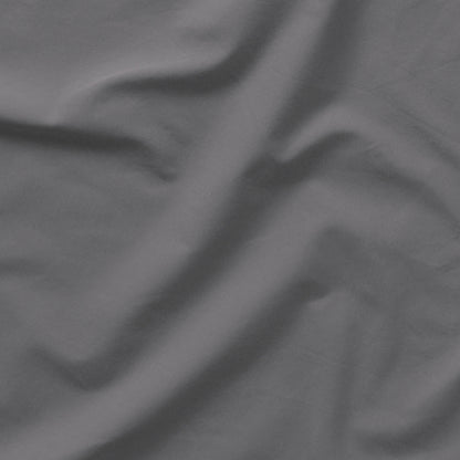 The Tuft and Needle Classic Percale Sheet Set, one sheet spread out || color: Gray Quill
